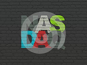 Stock market indexes concept: NASDAQ on wall background photo