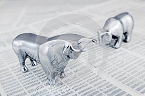 Stock market report with bull and bear