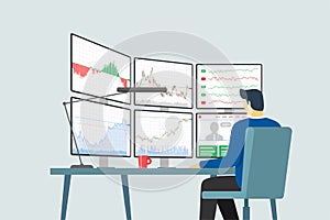 Stock market trader at workplace looking at multiple computer screens with financial charts, diagrams and graphs