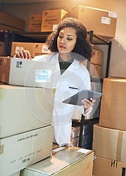 Stock, pharmacy and tablet with woman and box for wellness, medicine and storage. Inventory, medical and healthcare with
