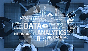Data Analytics and Machine Learning Concept in Modern Work Environment with Tables, Hands, and Technology Visuals