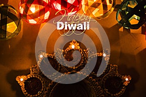 Happy diwali - diwali greeting card with illuminated diya