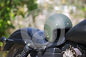 Stock Photo - helmet and glasses on the seat of a motorcycle