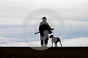 Stock Photo: hunter with a dog