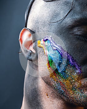 Stock photo male face, makeup art. Handsome caucasian man close up