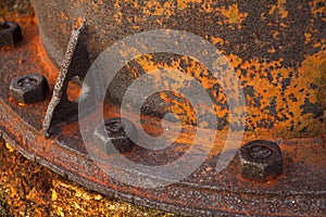 Stock Photo - Old rusty metal nut on iron water valve