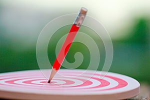 Stock Photo - The pencil hits the target