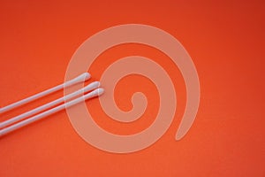 Stock photo of a pile of white cotton buds that are lined up and neatly arranged so that it looks aesthetic.