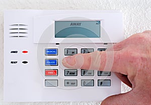 Stock Photo: Setting the Alarm System