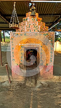 Stock photo of small hindu temple of goddess bhavani or tulaja bhavani mata, small wooden swing hanging around temple