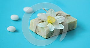 Stock-photo-spa-beauty-nature-background-flowers-stones-and-soap