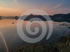 Stock photo of two black inner tube cover by black color plastic floating on lake water at Rankala lake , Kolhapur, Maharashtra,