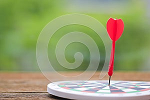Stock Photo - two darts hit the dead centre of target