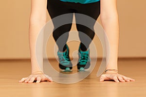 Stock photo of a young woman doing push-ups