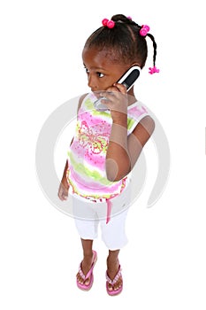 Stock Photography: Adorable Young Girl Standing With Cellphone