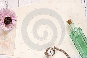 Stock photography flat lay text letter envelope flower glass bottle and pocket clock