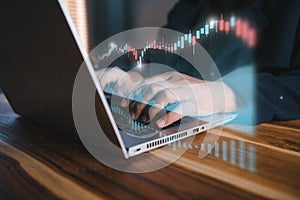 Stock Trade and Money Exchange Online Market Concept. Businesswoman is Stock Trading  Analysis on Laptop With Screen Chart Diagram