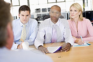 Stock Traders Conducting Interview