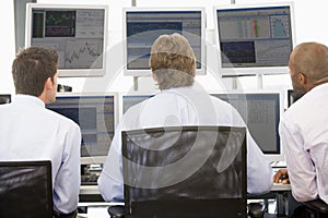 Stock Traders Viewing Monitors