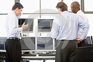 Stock Traders Viewing Monitors