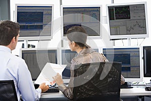 Stock Traders Viewing Monitors