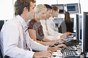 Stock Traders Working At Computers