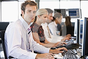 Stock Traders Working At Computers