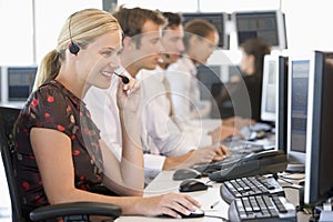 Stock Traders Working At Computers photo