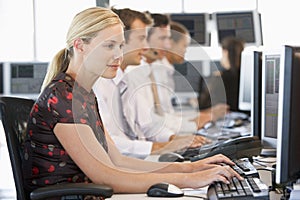 Stock Traders Working At Computers