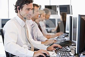 Stock Traders Working At Computers