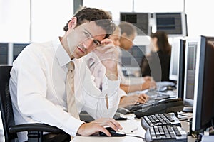 Stock Traders Working At Computers