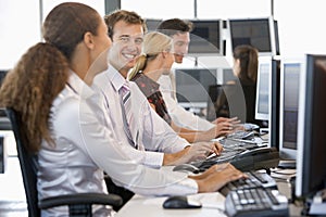 Stock Traders Working At Computers