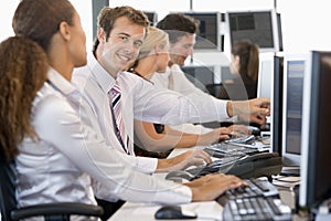 Stock Traders Working At Computers