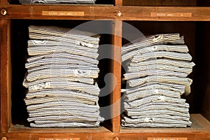 Stock of yukata on wood shelf