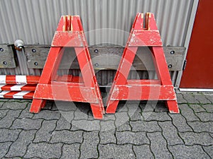 Stocked parts of construction barrier looking like Anonymous Alcoholics sign