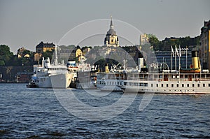 Stockholm old town and steamboats, Sweden. photo