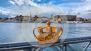 Stockholm old town Gamla Stan cityscape and Royal crown, Sweden