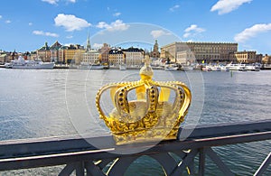Stockholm old town Gamla Stan cityscape and Royal crown, Sweden