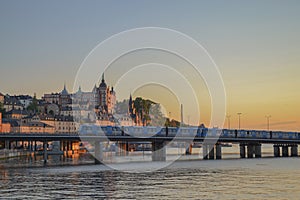 Stockholm subway over the water, sunset