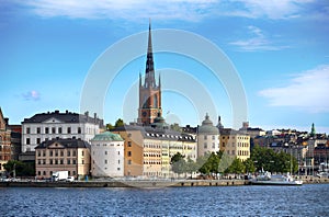 STOCKHOLM, SWEDEN - AUGUST 20, 2016: Tourists boat and View of G