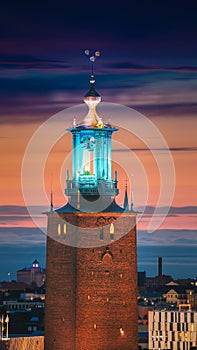 Stockholm, Sweden. Close View Of Famous Tower Of Stockholm City Hall. Popular Destination Scenic In Sunset Twilight Dusk