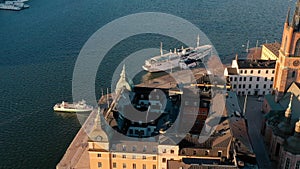 STOCKHOLM, SWEDEN - FEBRUARY, 2020: Aerial view of Stockholm city centre Gamla stan. Flying over buildings in old town.