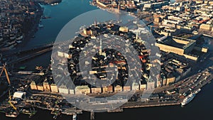 STOCKHOLM, SWEDEN - FEBRUARY, 2020: Aerial view of Stockholm city centre Gamla stan. Flying over buildings in old town.