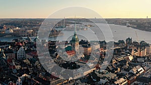 STOCKHOLM, SWEDEN - FEBRUARY, 2020: Aerial view of Stockholm city centre Gamla stan. Flying over buildings in old town.