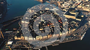 STOCKHOLM, SWEDEN - FEBRUARY, 2020: Aerial view of Stockholm city centre Gamla stan. Flying over buildings in old town.