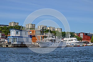 Floating homes and boats docked at Pampas Marina, Stockholm, Sweden