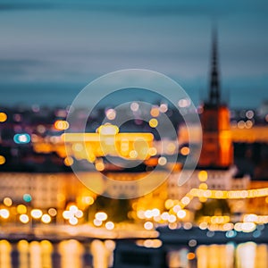 Stockholm, Sweden. Night Skyline Abstract Boke Bokeh Background. Design Backdrop. Riddarholm Church In Night Lighting.