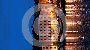 Stockholm, Sweden. Scenic Night View Of Embankment In Old Town Of Stockholm. Gamla Stan In Summer Evening. Vertical