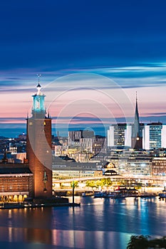 Stockholm, Sweden. Scenic Skyline View Of Famous Tower Of Stockholm City Hall And St. Clara Or Saint Klara Church