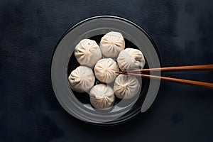 StockImage Traditional Korean Mandu dumplings presented elegantly with chopsticks